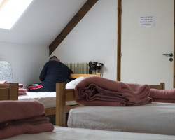 Martin trying to boost the central heating at the hostel. Martin trying to boost the central heating at the hostel.
