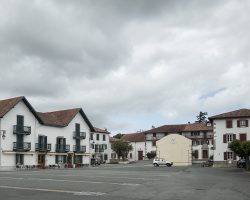 Not very busy in Helette. The grocery store closed in April. Two coffee shops anyway. In the evening, young people practice pelotte, a Basque game. Helette. France. Not very busy in Helette. The grocery store closed in April. Two coffee shops anyway. In the evening, young people practice pelotte, a Basque game. Helette. France.