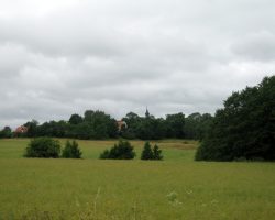 Typical view in this part of Sweden. It has been a rich landscape, the farmers could aford to build churches in every village. To Normlösa. Sweden. Typical view in this part of Sweden. It has been a rich landscape, the farmers could aford to build churches in every village. To Normlösa. Sweden.