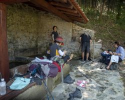 Resting at a nice spring. To Grado. Camino Primitivo. Pilgrims resting. To Grado. Camino Primitivo.