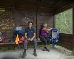 With Fernanda in a shelter thar looked like a bus stop. To Pola de Allande. Camino Primitivo. With Fernanda in a shelter thar looked like a bus stop. To Pola de Allande. Camino Primitivo.